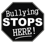 Octagonal sign that states "Bullying Stops HERE!"